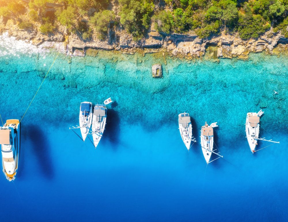 aerial-view-of-beautiful-yachts-boats-on-the-sea-bay-at-sunset.jpg