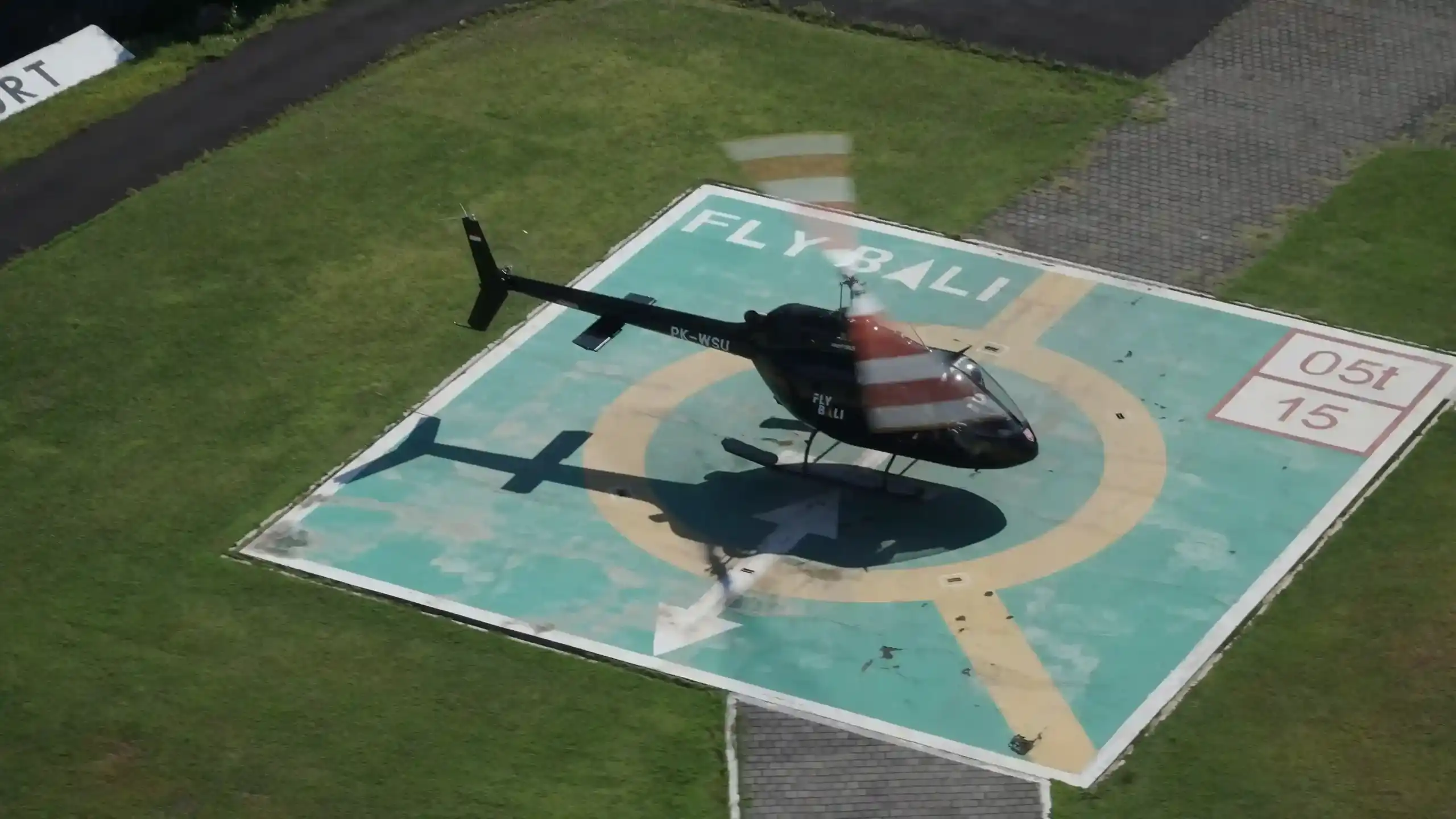 Private helicopter charter over the Bali coastline arranged door to door with chauffeured airport transfer